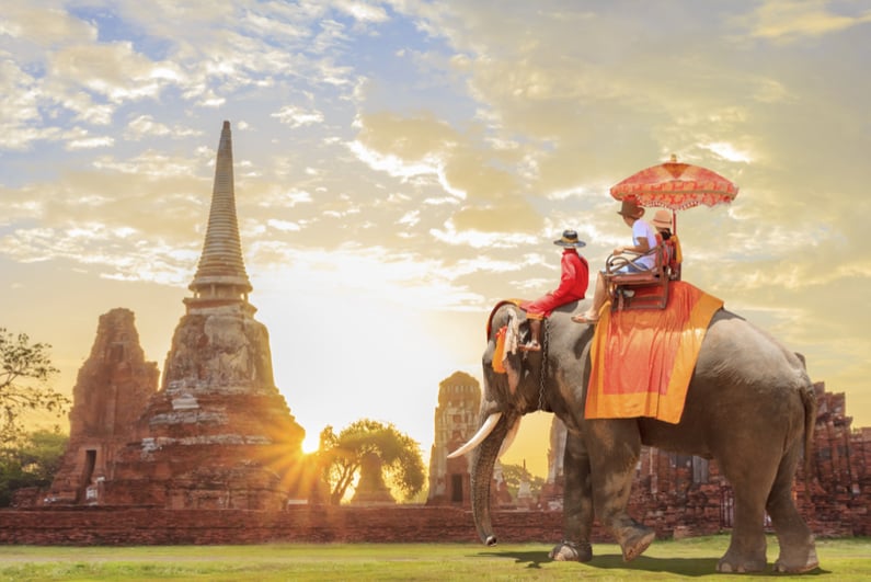 Tourists on elephant ride in Cambodia